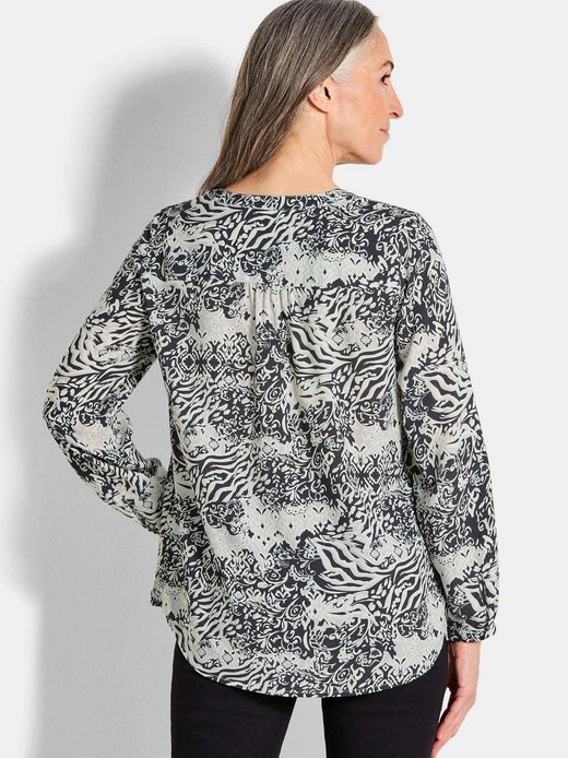 Damen Kurzgröße: Florale Druckbluse mit V-Ausschnitt