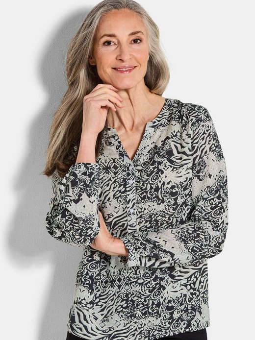 Damen Kurzgröße: Florale Druckbluse mit V-Ausschnitt