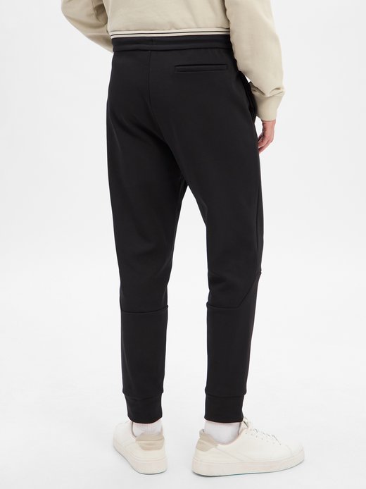 Męskie spodnie dresowe - Zone